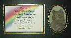 Photo Mount: Black with a 3.5x5 Oval Opening -- Background Image Paper: Rainbow on White Clouds --  Poem: We Only Wanted You --- Click for a larger image.
